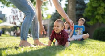 baby-with-parent-crawling