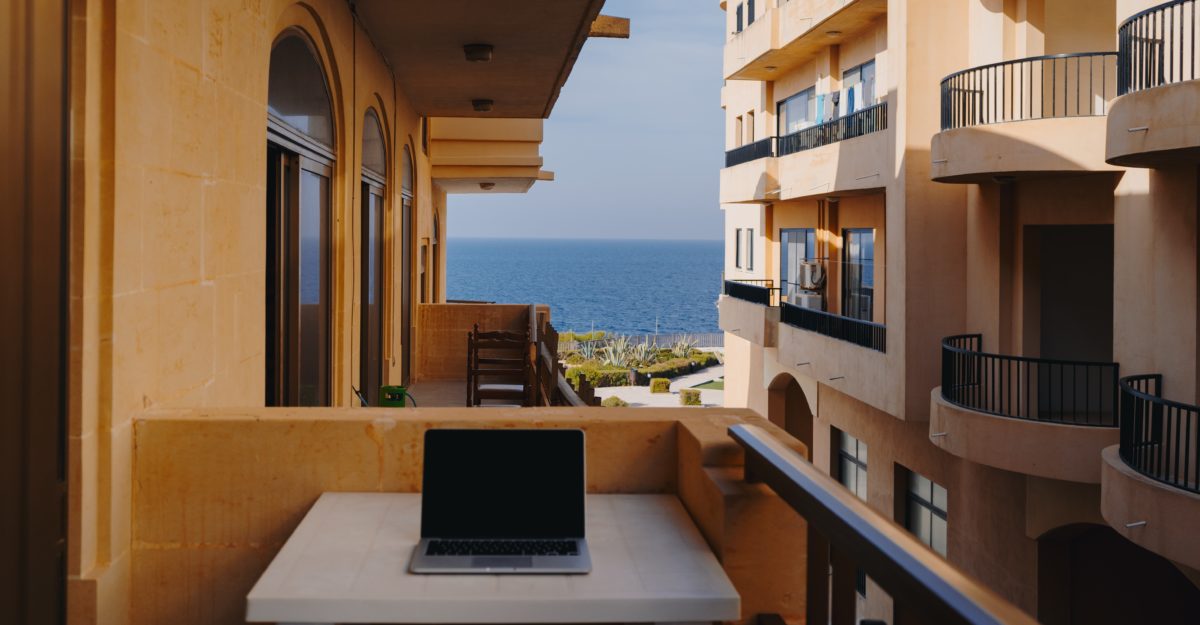 Working Remotely from balcony on laptop