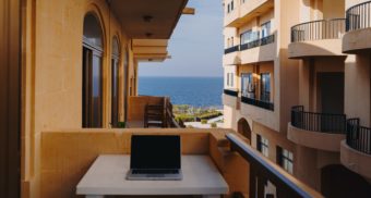 Working Remotely from balcony on laptop