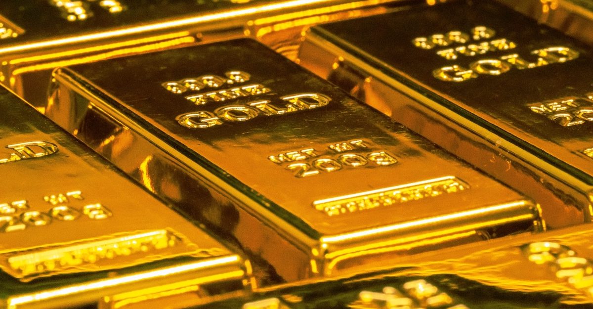 Multiple bars of gold placed side by side. Kinross Gold is a Canadian gold-producer