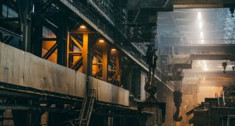 A labyrinth of walkways, ladders and equipment in a massive manufacturing plant. Nova Steel employees are entitled to full severance pay when they lose their job.