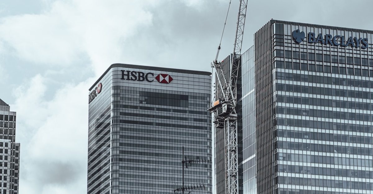 The Barclays and HSBC names are each displayed on separate, tall office towers.