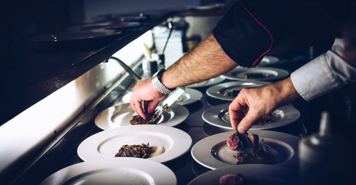 A chef plating food in Italy. (Photo: Fabrizio Magoni / Unsplash)