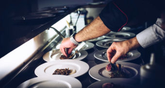 A chef plating food in Italy. (Photo: Fabrizio Magoni / Unsplash)