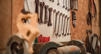 A photo of a workbench with various tools. (Photo: Nina Mercado / Unsplash)