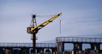 A shipyard construction crane used for building vessels, like those constructed at Heddle Shipyards in Canada.