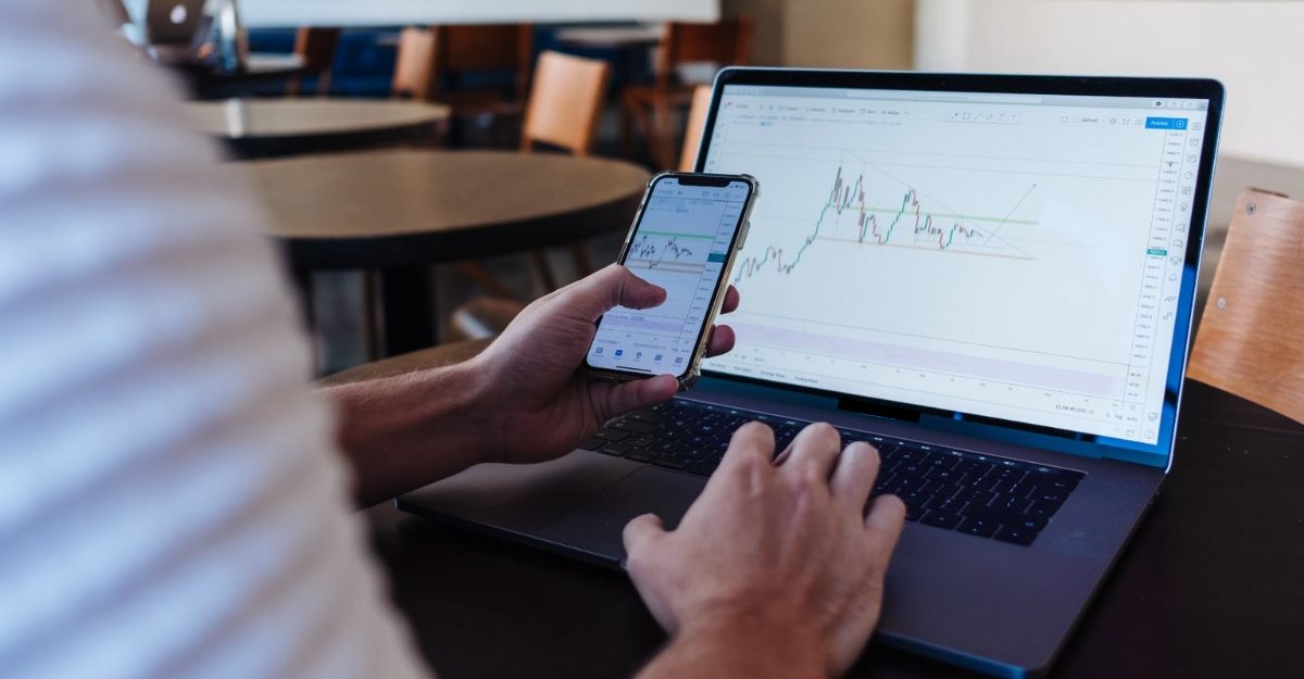 A photo of a person looking at a stock's performance. (Photo: Jason Briscoe / Unsplash)