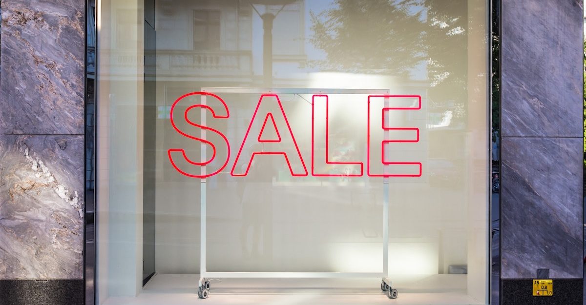 A store window advertises a sale during Boxing Day in Ontario.