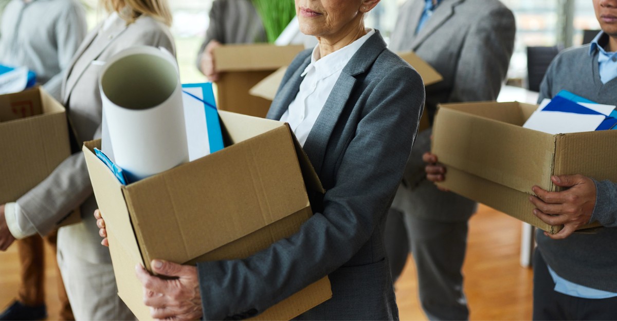 A photo of multiple people with cardboard boxes in their hands. (Photo: MarketWatch / Google Images)