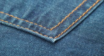 A close-up photo of a pocket on a pair of jeans. (Photo: Engin Akyurt / Unsplash)