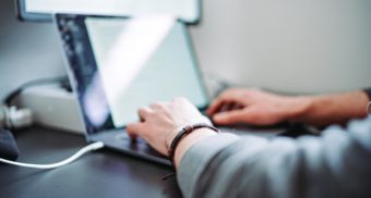 A photo of a person using a laptop. (Photo: Zanilic / Unsplash)