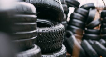 Stacks of tires, like those distributed by Group Touchette and its subsidiaries.