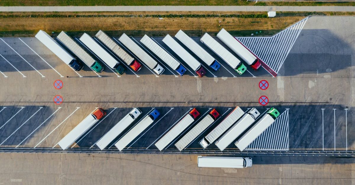 A fleet of parked trucks, perhaps working for CEVA Logistics.