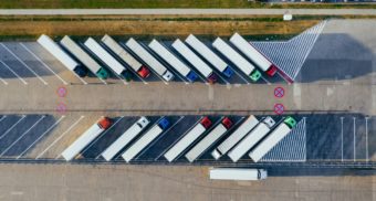 A fleet of parked trucks, perhaps working for CEVA Logistics.