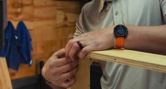 A photo of a person creating a wooden frame in a workshop. (Photo: Ryno Marais / Unsplash)