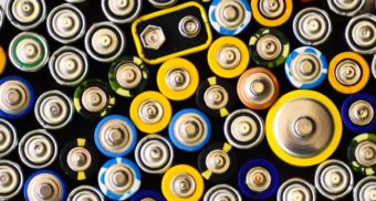 A photo of various batteries on a table. (Photo: Vardan Papikyan / Unsplash)