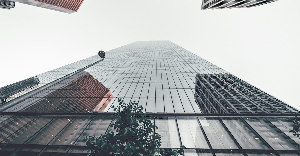 A view of a Calgary office tower from the ground.