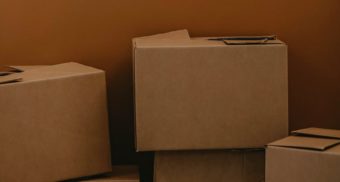 A photo of cardboard boxes. (Photo: Kadarius Seegars / Unsplash)