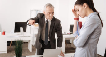 An employee is yelled at by her boss. (Photo: Sexual Harassment Training)