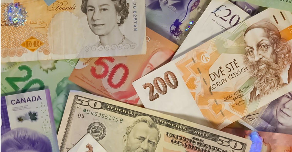 A photo of currency from various countries. (Photo: John McArthur / Unsplash)