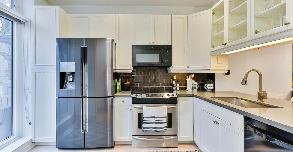 A kitchen featuring several home appliances, like those sold by Whirlpool.