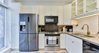 A kitchen featuring several home appliances, like those sold by Whirlpool.
