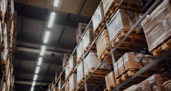 A photo of boxes in a warehouse. (Photo: CHUTTERSNAP / Unsplash)