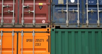 A number of steel containers stacked next to each other, potentially sold by WillScot of Canada.