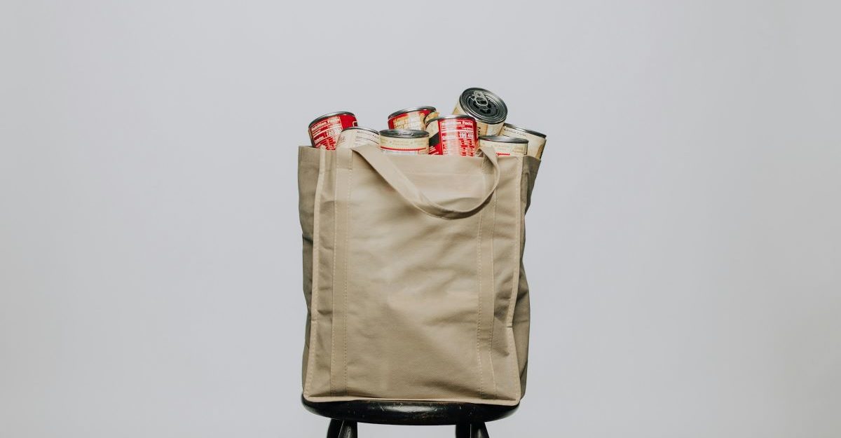 A bag filled with soup cans, potentially made by Campbell Company of Canada.