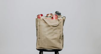 A bag filled with soup cans, potentially made by Campbell Company of Canada.