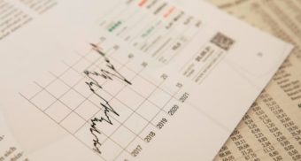 Financial charts and data that a Canadian Portfolio Manager might use.