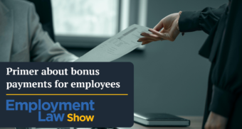 Employee handing document to boss