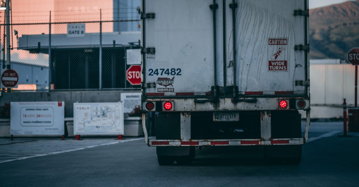 The back end of a transport truck, potentially used by TFI International.