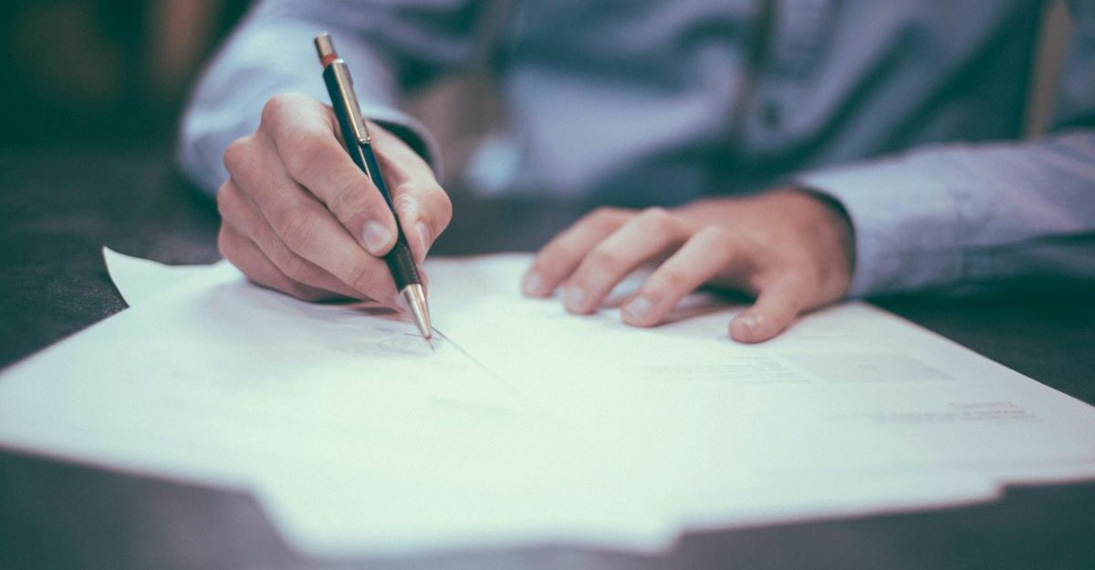 An employee signs a full and final release after losing their job.