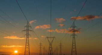 Energy transmission lines extending to the horizon, potentially operated by Capital Power.