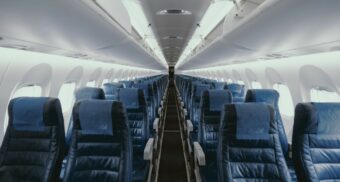 A photo showing the interior of an airplane. (Photo: JC Gellidon / Unsplash)