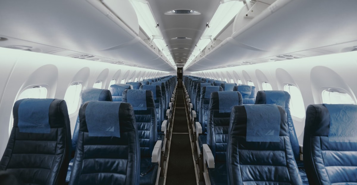 A photo showing the interior of an airplane. (Photo: JC Gellidon / Unsplash)