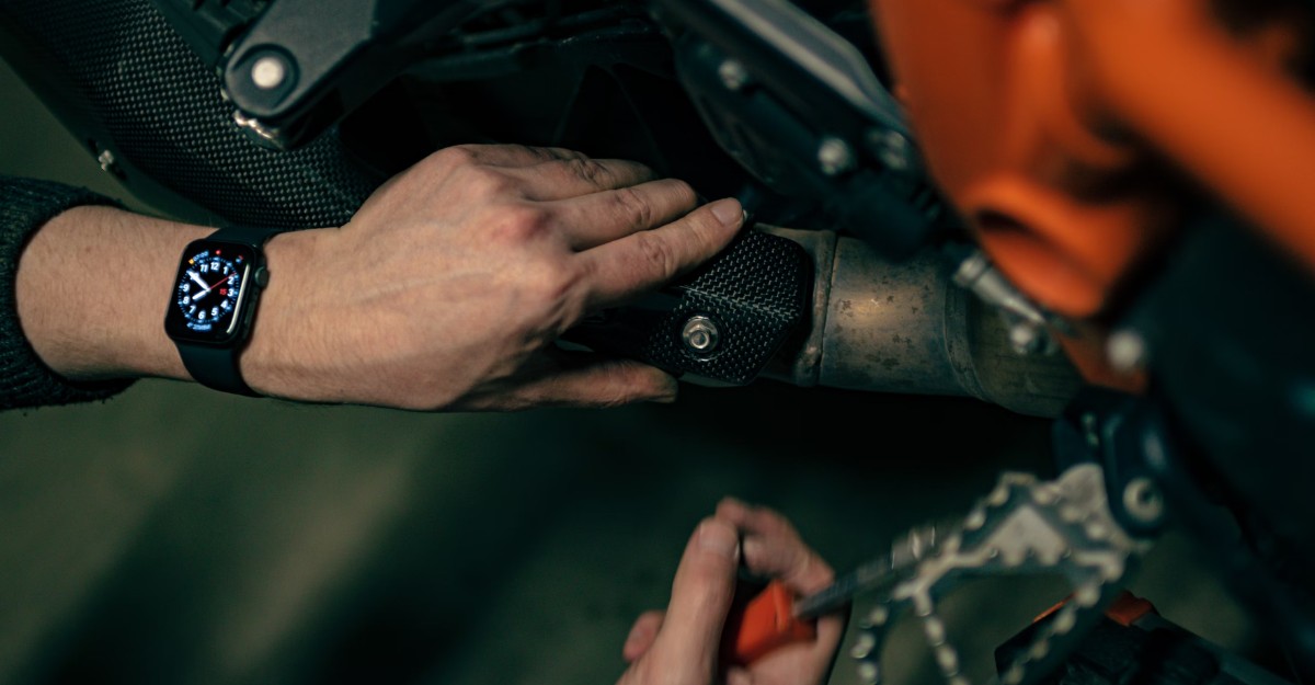 A photo of a person working on a vehicle. (Photo: Kat Sazonova / Unsplash)