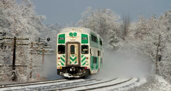 A GO Train operates in Ontario during the winter.