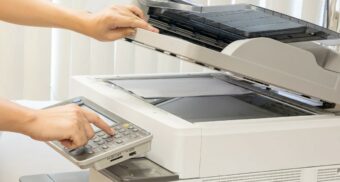 A photo of a person using a photocopier. (Photo: Google Images)