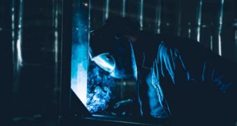 A photo of a welder working. (Photo: Dan Schiumarini / Unsplash)