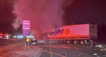 A photo of smoke billowing out of a damaged tractor-trailer on Highway 401 near Kingston. (Photo: OPP_ER / X/Twitter)