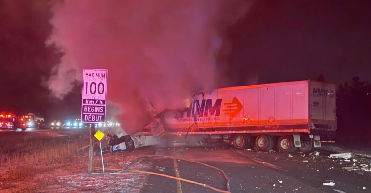 A photo of smoke billowing out of a damaged tractor-trailer on Highway 401 near Kingston. (Photo: OPP_ER / X/Twitter)