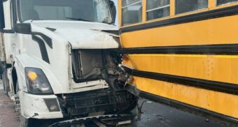 A photo of a collision between a school bus and a tractor-trailer on Highway 12 near Orillia. (Photo: OPP / X/Twitter)