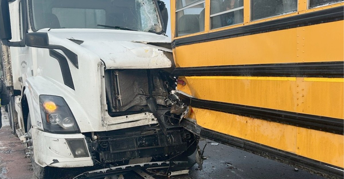 A photo of a collision between a school bus and a tractor-trailer on Highway 12 near Orillia. (Photo: OPP / X/Twitter)