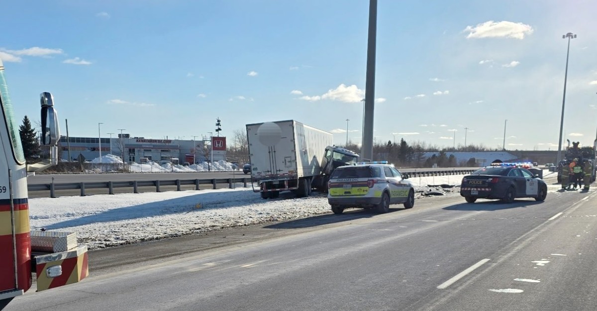 A photo of a transport truck that collided with the median on Highway 417 in Kanata. (Photo: OPP_ER / X/Twitter)