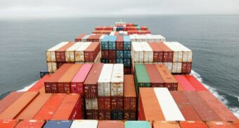 A photo of various containers on a cargo ship. (Photo: nessa_rin / Unsplash)