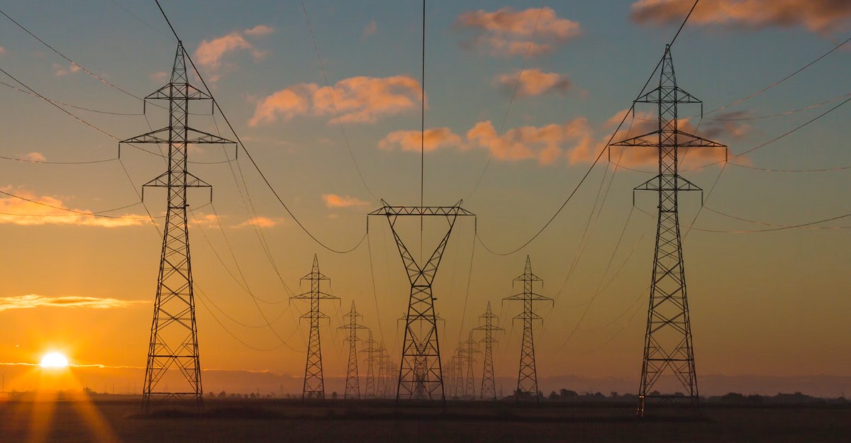 A photo of truss towers during a sunset. (Photo: Matthew Henry / Unsplash)