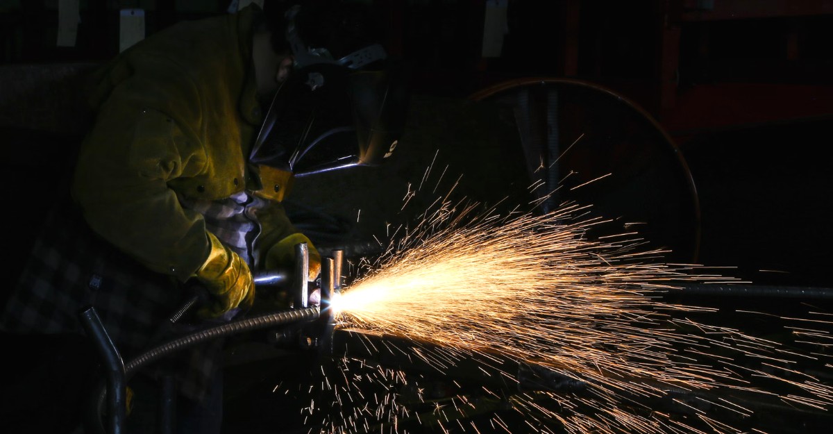 airbus-helicopter-centre-niagara-falls-may-2025 A photo of a welder hard at work. (Photo: Glenn Hansen / Unsplash)