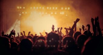 billy-joel-brain-disorder-diagnosis-may-2025 A photo of people enjoying a concert. (Photo: vishnurnair / Unsplash)